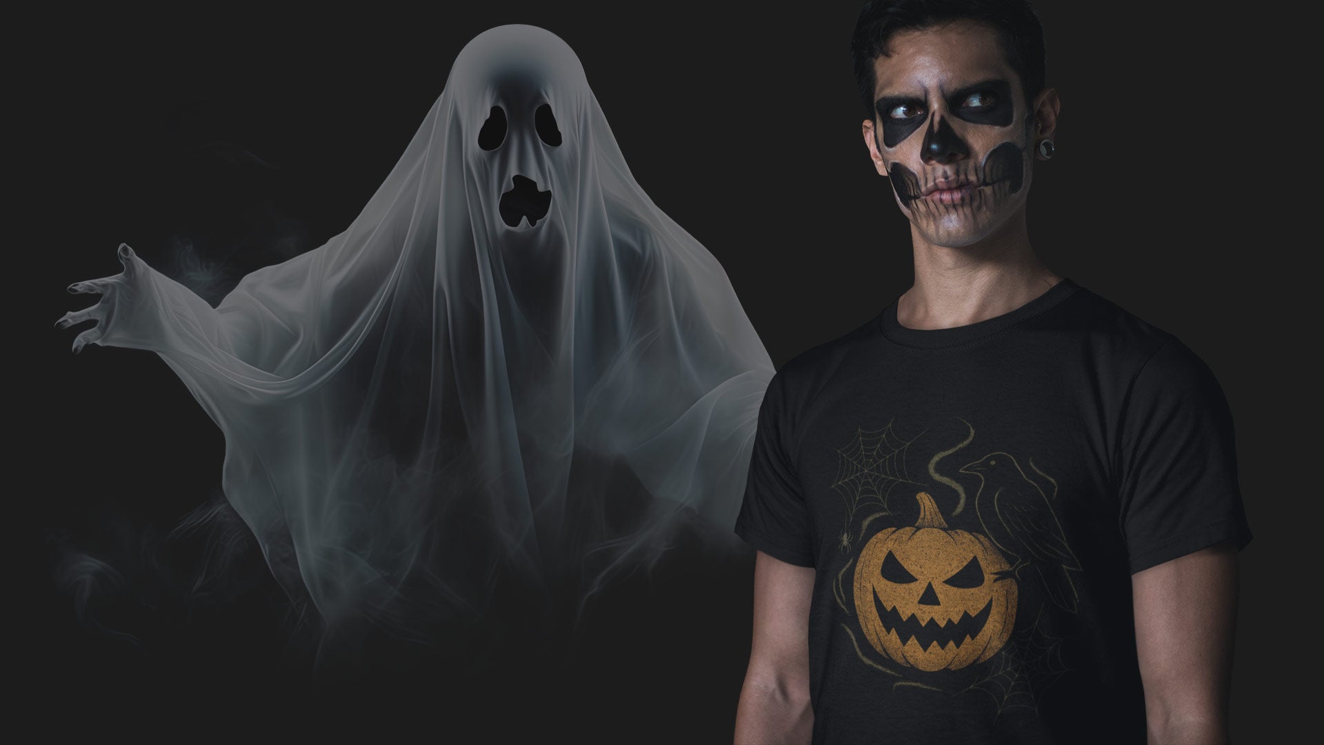 Man with skull face paint wearing black Halloween t-shirt featuring pumpkin print, standing beside spooky ghost figure on dark background – atmospheric Halloween banner for spooky shirts and seasonal fashion.