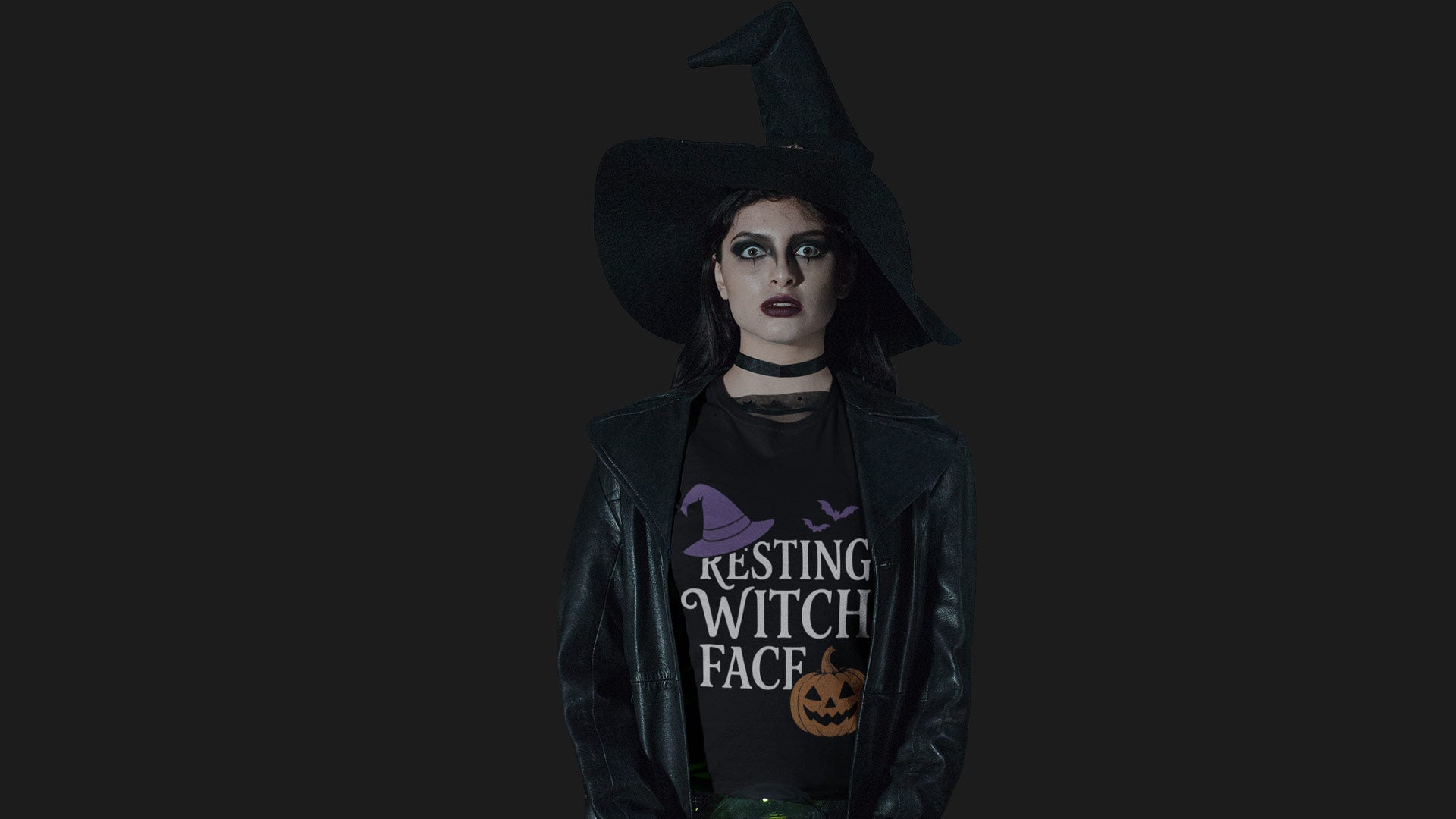 Woman dressed as witch wearing black t-shirt with funny Halloween quote 'Resting Witch Face' – playful banner for Cute & Funny Halloween Designs collection.